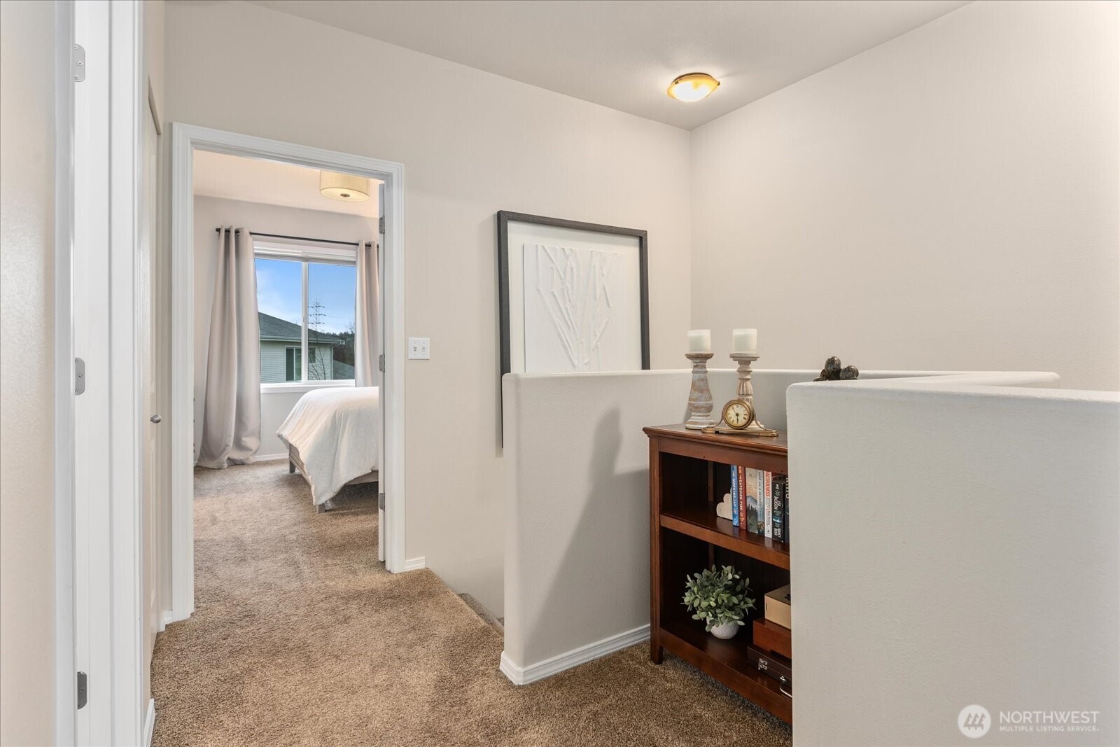 14915 38th Drive Southeast, Unit S1148 Bothell, WA 98012 - Photo 24 of 37 a view of a bedroom from a hallway