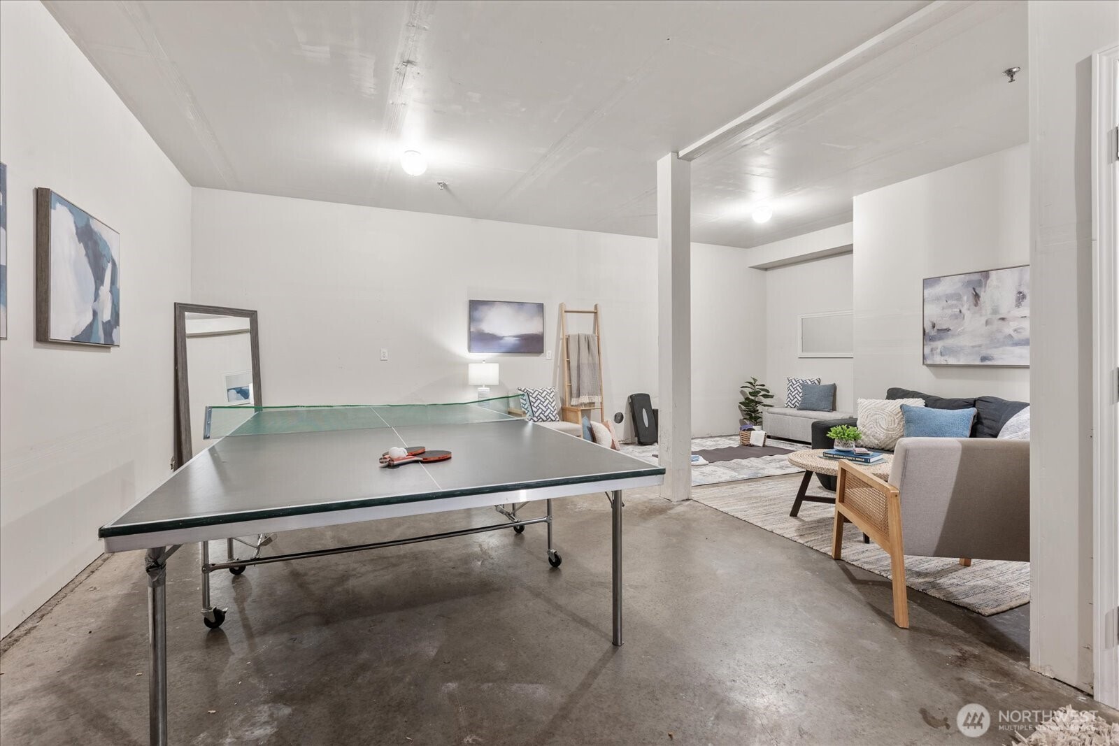 14915 38th Drive Southeast, Unit S1148 Bothell, WA 98012 - Photo 26 of 37 a room with table chairs and white walls