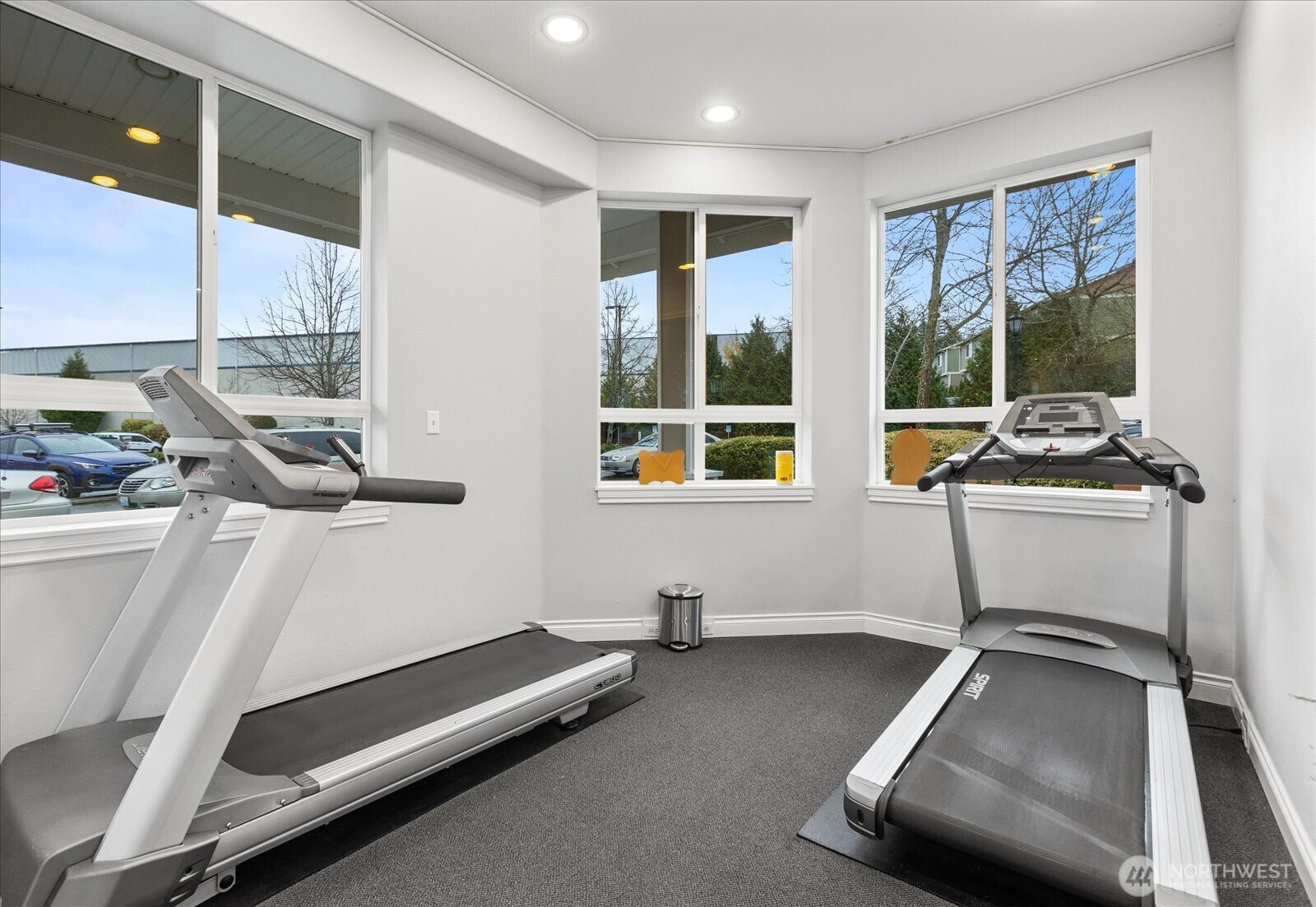 14915 38th Drive Southeast, Unit S1148 Bothell, WA 98012 - Photo 32 of 37 a room with gym equipment and a large window