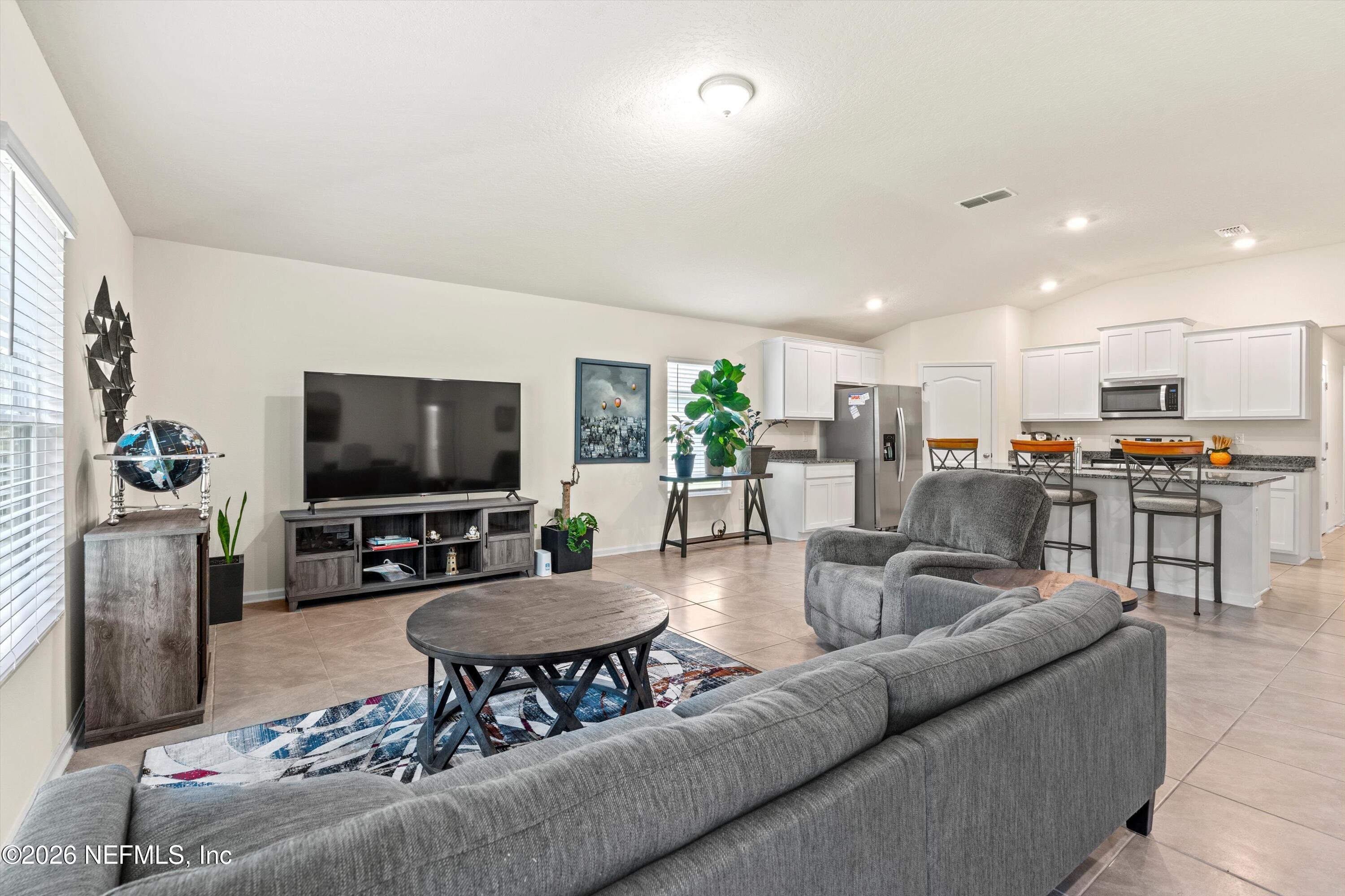 91 Rivertown Road Palm Coast, FL 32137 - Photo 13 of 36 10-Living Room