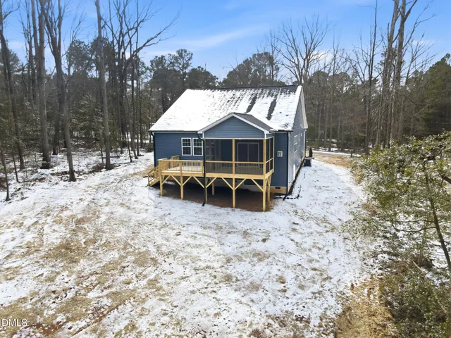 a view of empty room with windows