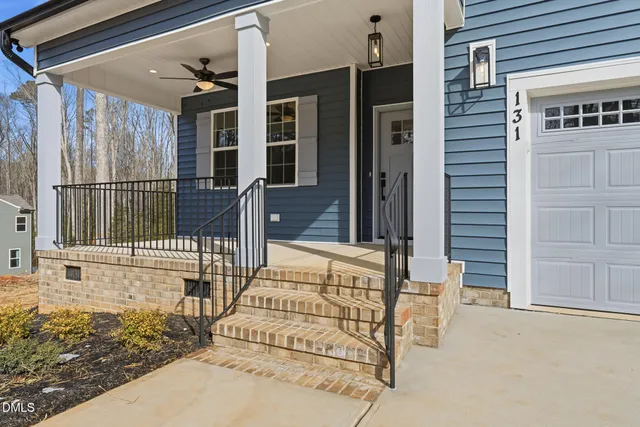 a view of an empty room with closet
