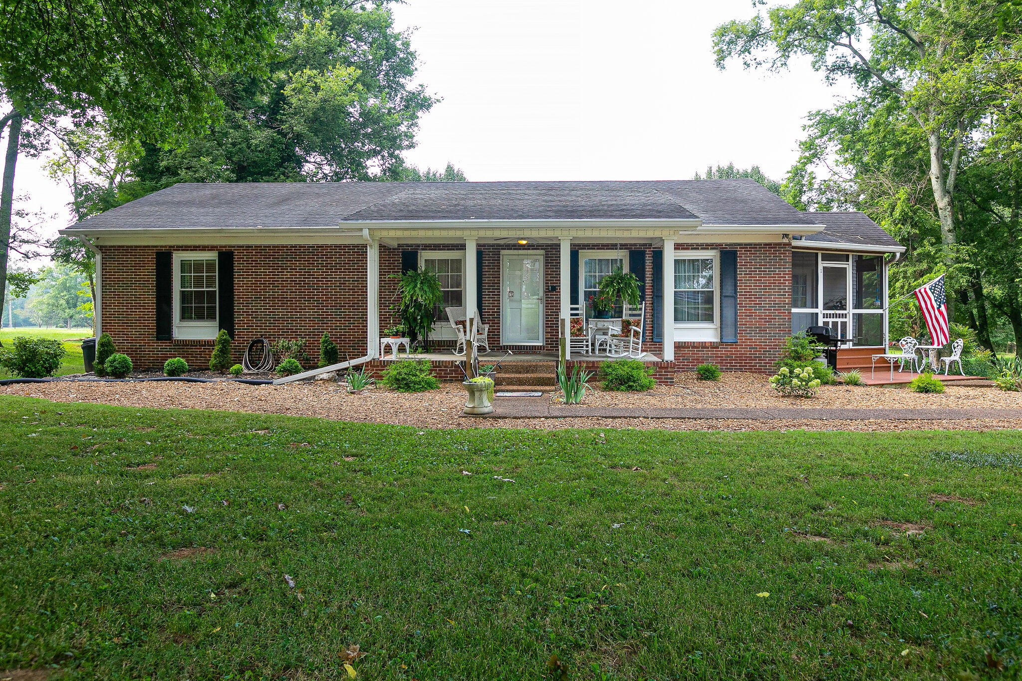 2116 Double Branch Road Columbia, TN 38401 - Photo 1 of 29 a view of a house with backyard sitting area and porch