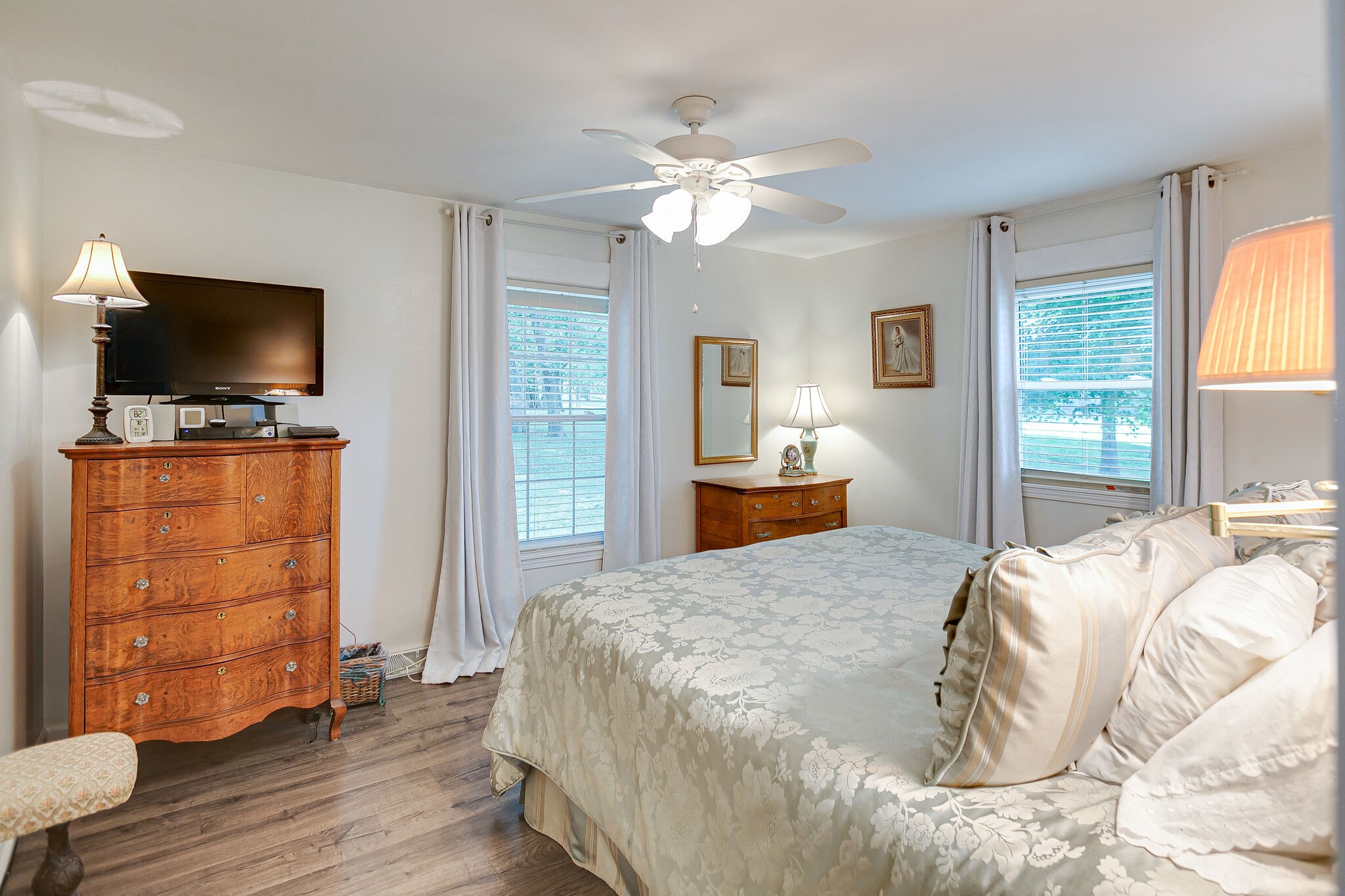 2116 Double Branch Road Columbia, TN 38401 - Photo 11 of 29 a bedroom with a bed and wooden floor