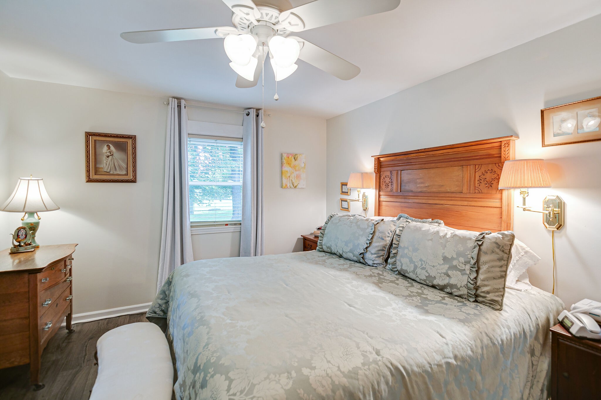 2116 Double Branch Road Columbia, TN 38401 - Photo 12 of 29 a bedroom with a bed and a chandelier