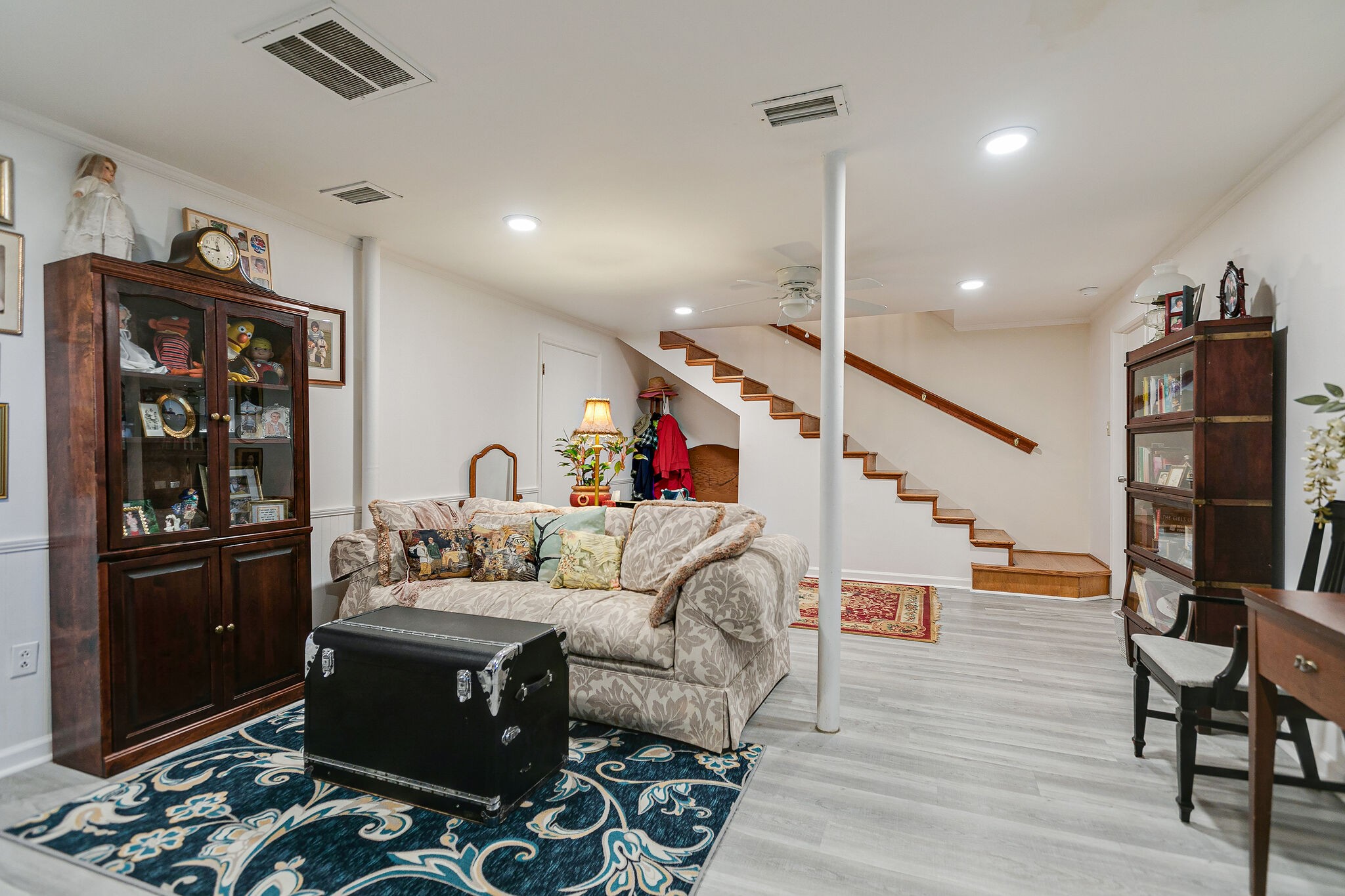 2116 Double Branch Road Columbia, TN 38401 - Photo 18 of 29 a living room with furniture a rug and a flat screen tv