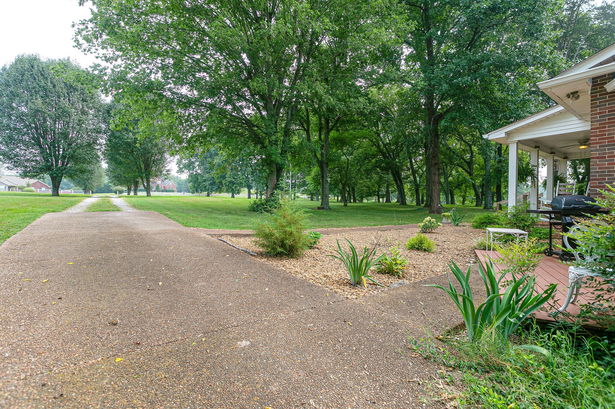 2116 Double Branch Road Columbia, TN 38401 - Photo 23 of 29 a view of a park with slide and bench