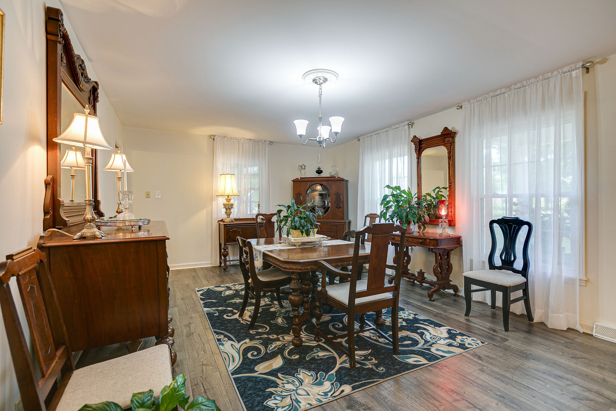 2116 Double Branch Road Columbia, TN 38401 - Photo 7 of 29 a view of a dining room with furniture window and wooden floor