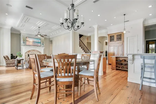 a view of a kitchen and dining room