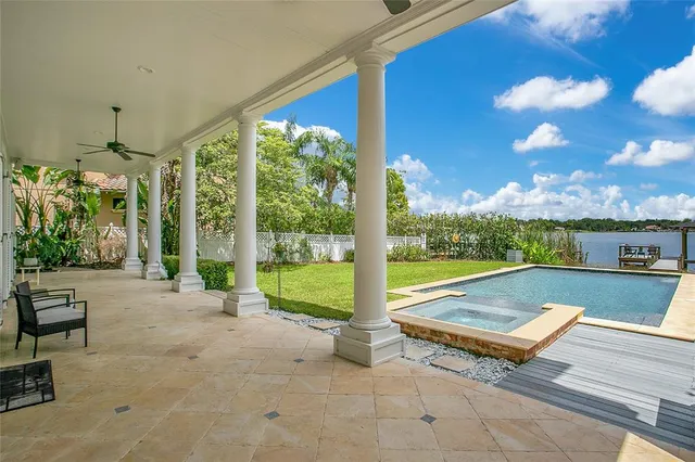 a kitchen with a sink and a refrigerator