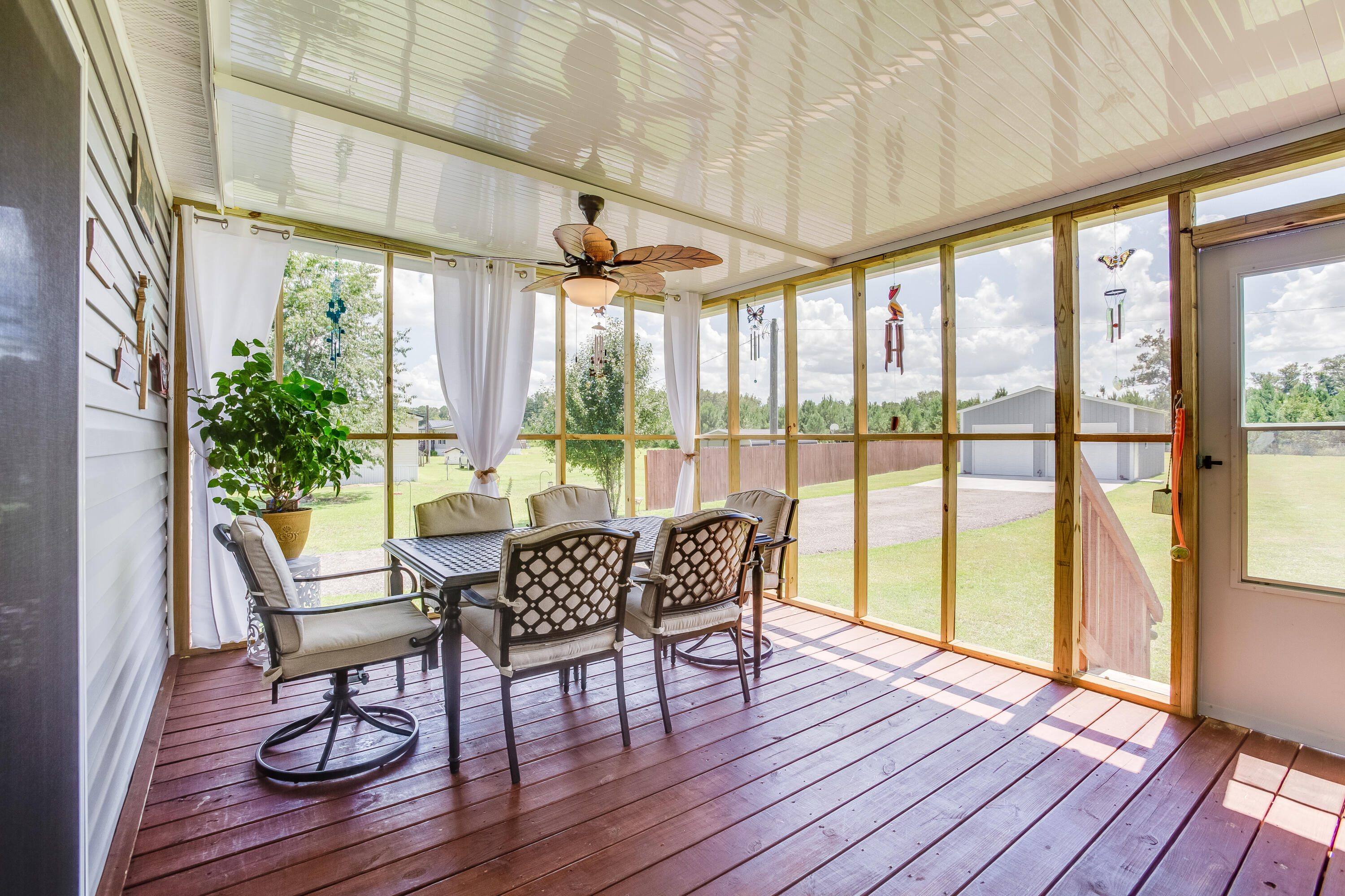 654 Second Texas Road St. George, SC 29477 - Photo 9 of 34 Back Screened Porch