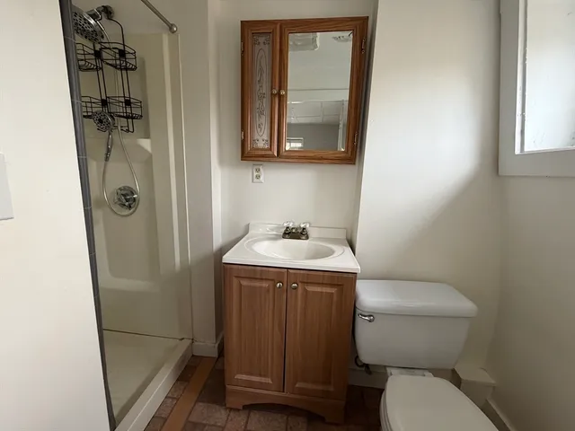 a bathroom with a toilet and a sink