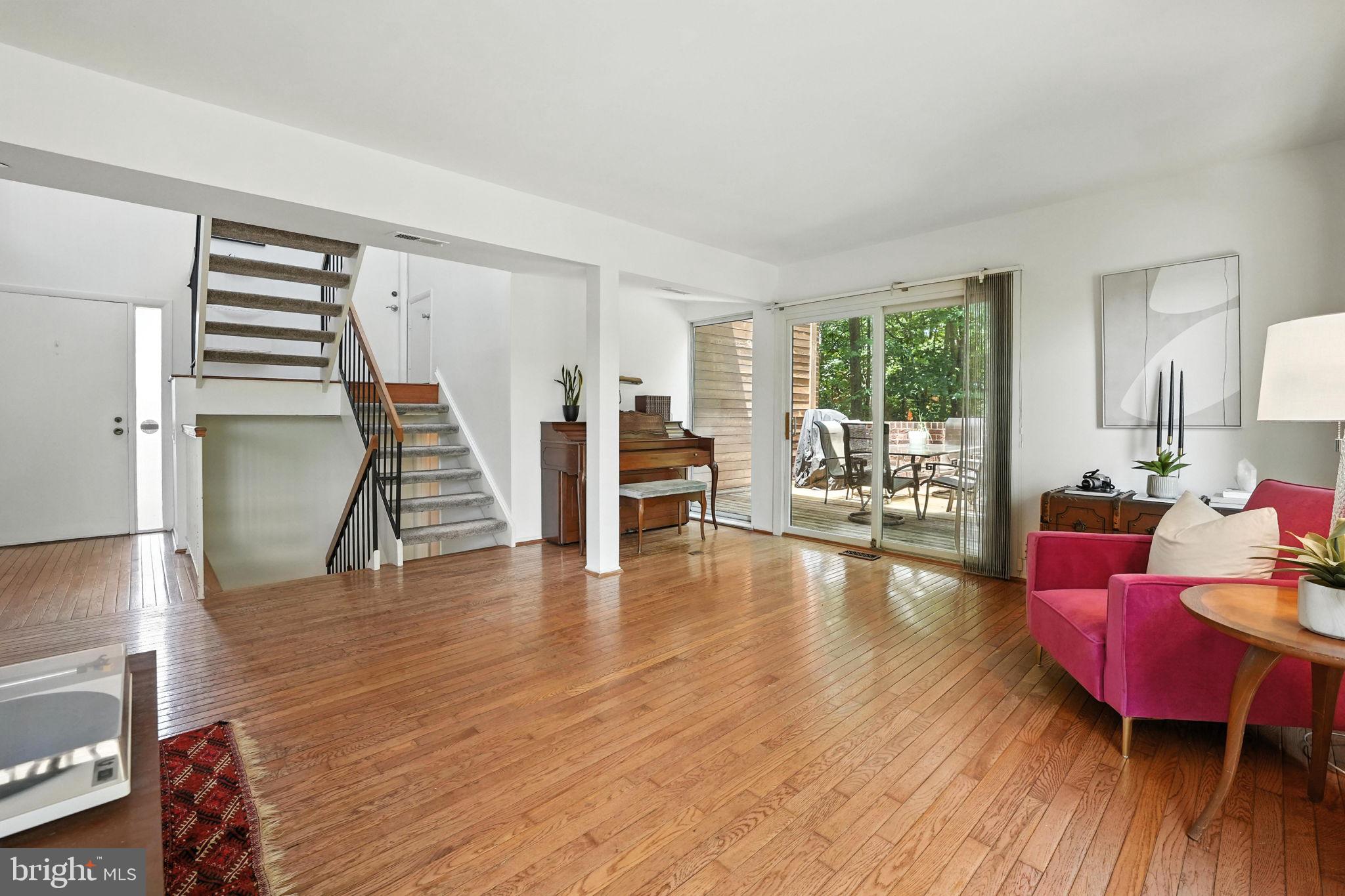 2151 Cabots Point Lane Reston, VA 20191 - Photo 12 of 71 a living room with furniture and wooden floor