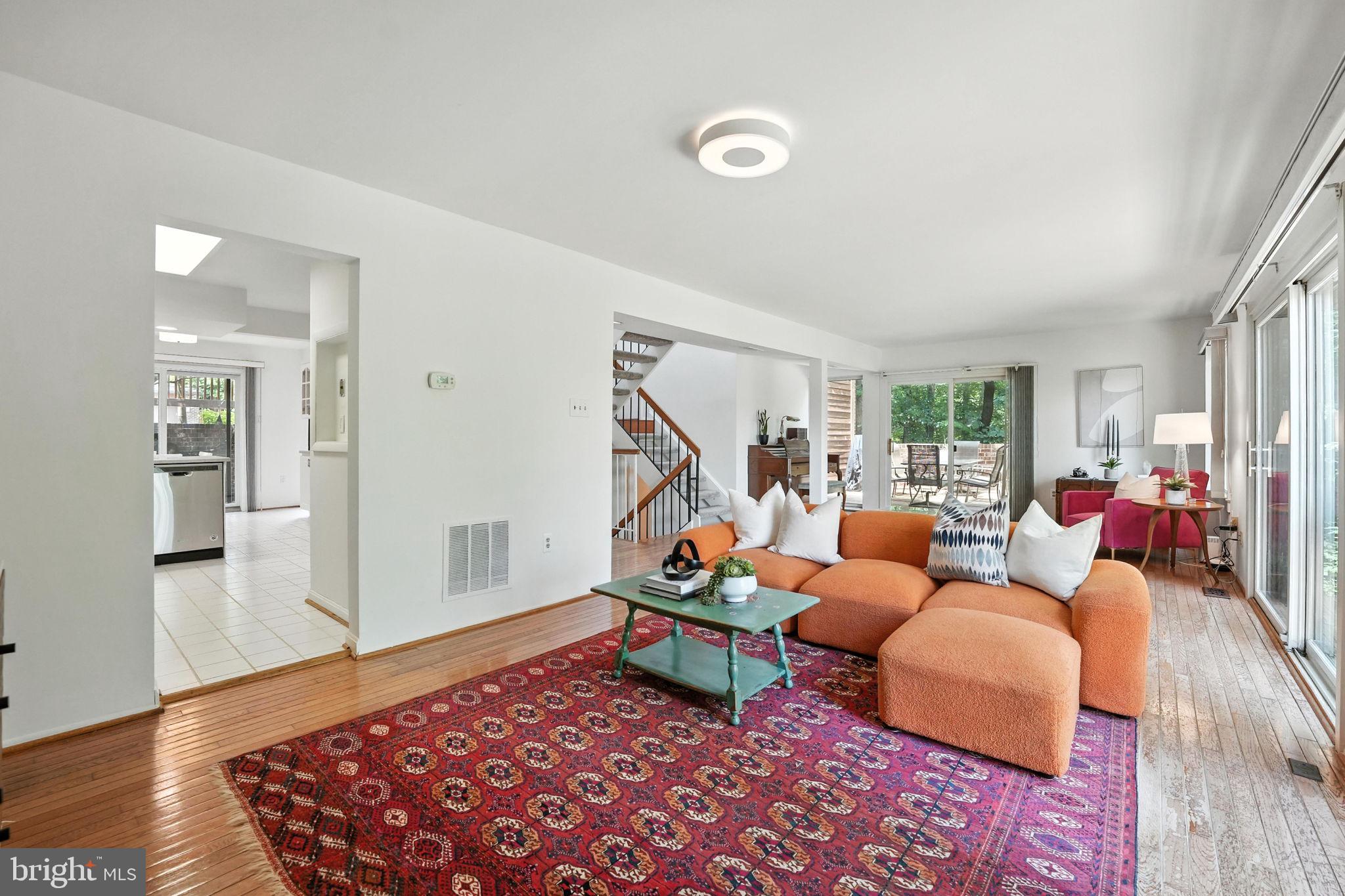 2151 Cabots Point Lane Reston, VA 20191 - Photo 13 of 71 a living room with furniture and wooden floor