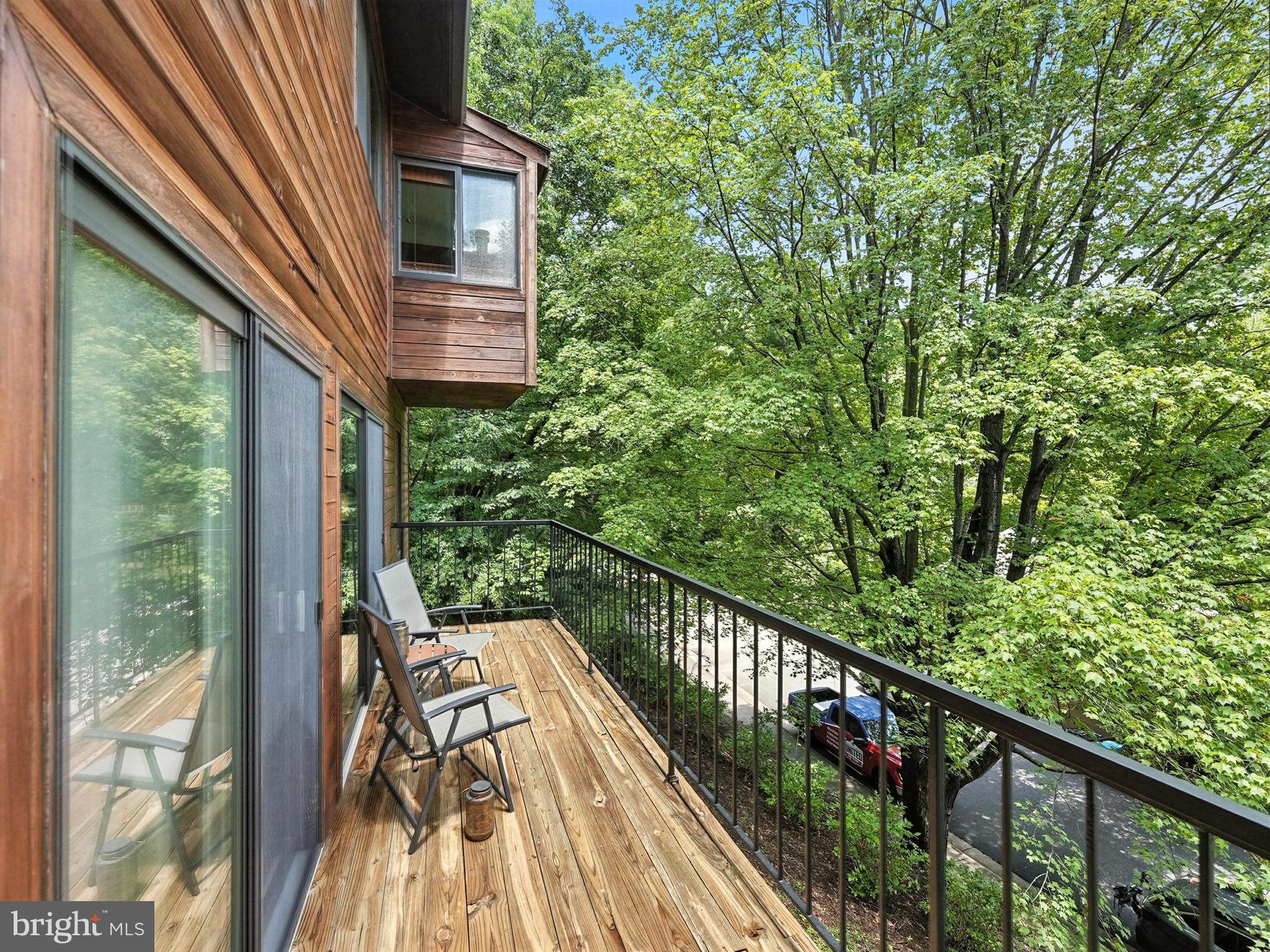 2151 Cabots Point Lane Reston, VA 20191 - Photo 15 of 71 a balcony with wooden floor and outdoor space