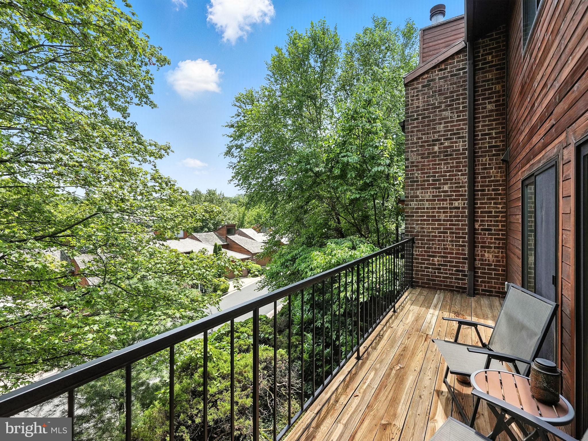 2151 Cabots Point Lane Reston, VA 20191 - Photo 16 of 71 a view of balcony with wooden floor and outdoor seating