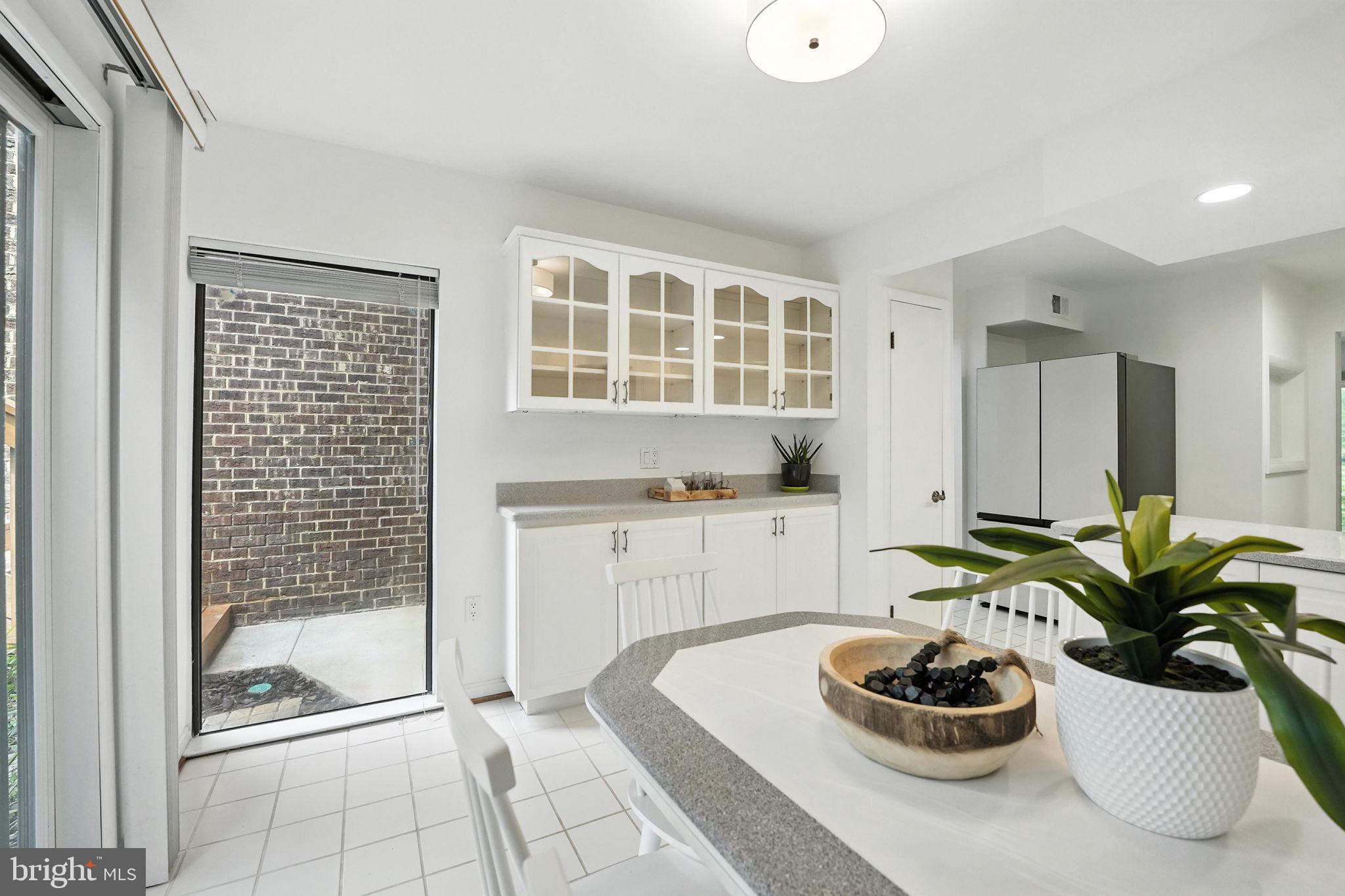 2151 Cabots Point Lane Reston, VA 20191 - Photo 26 of 71 a kitchen with a refrigerator and a sink