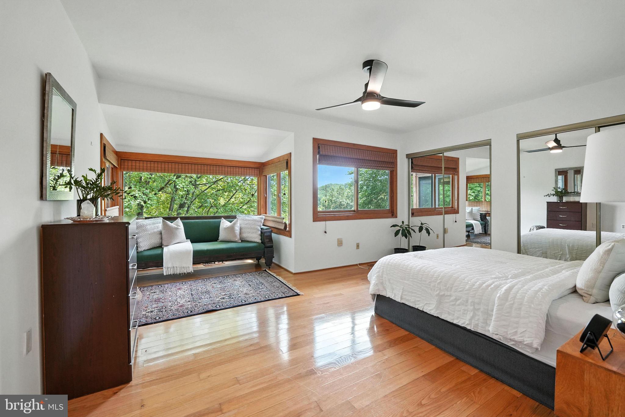 2151 Cabots Point Lane Reston, VA 20191 - Photo 30 of 71 a bedroom with a large bed and windows