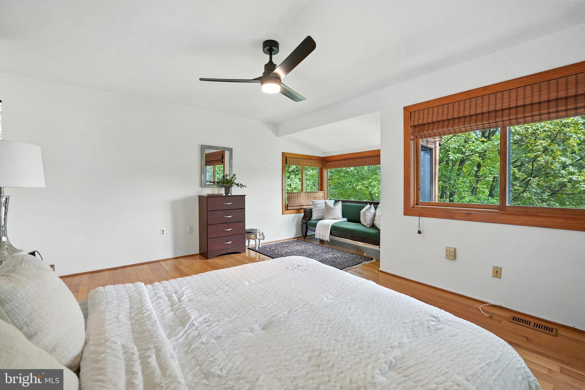 2151 Cabots Point Lane Reston, VA 20191 - Photo 32 of 71 a bedroom with a large bed and a large window