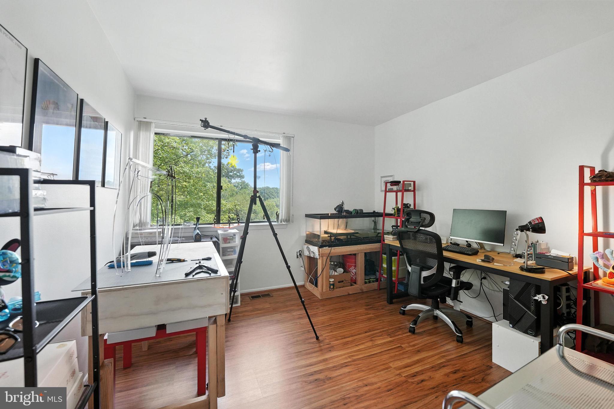 2151 Cabots Point Lane Reston, VA 20191 - Photo 33 of 71 a view of a workspace with furniture and a window