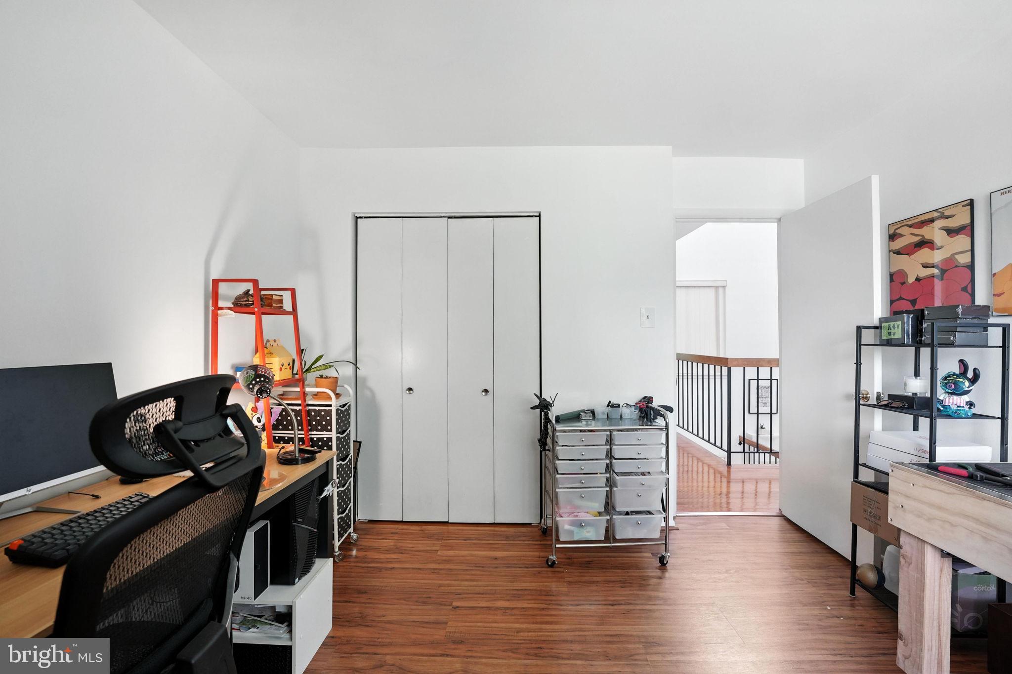 2151 Cabots Point Lane Reston, VA 20191 - Photo 34 of 71 a view of a workspace with furniture and wooden floor