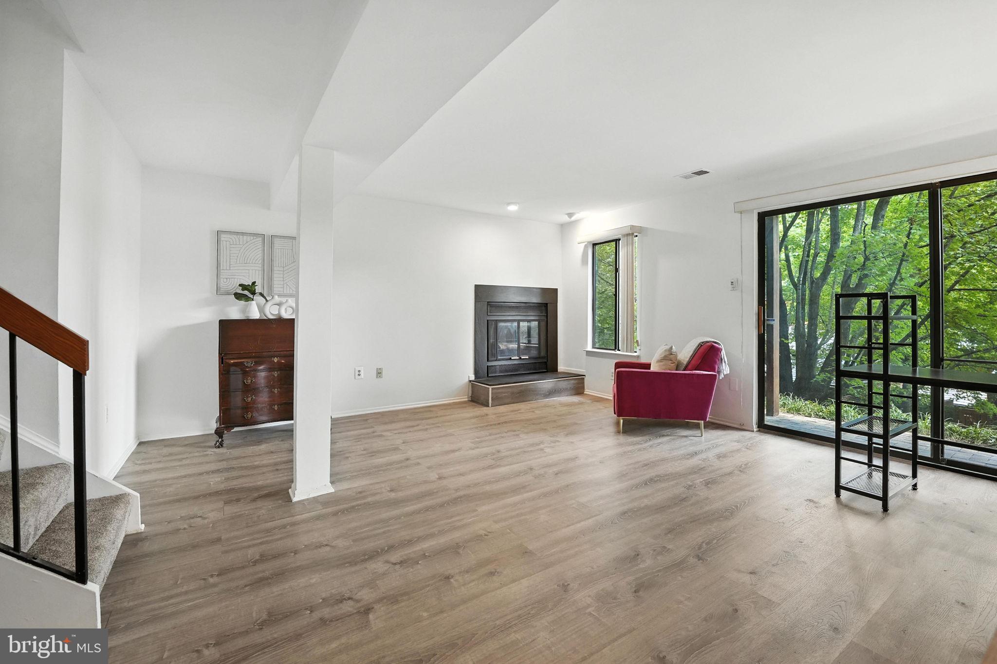 2151 Cabots Point Lane Reston, VA 20191 - Photo 45 of 71 a spacious bedroom with a bed and a view of balcony