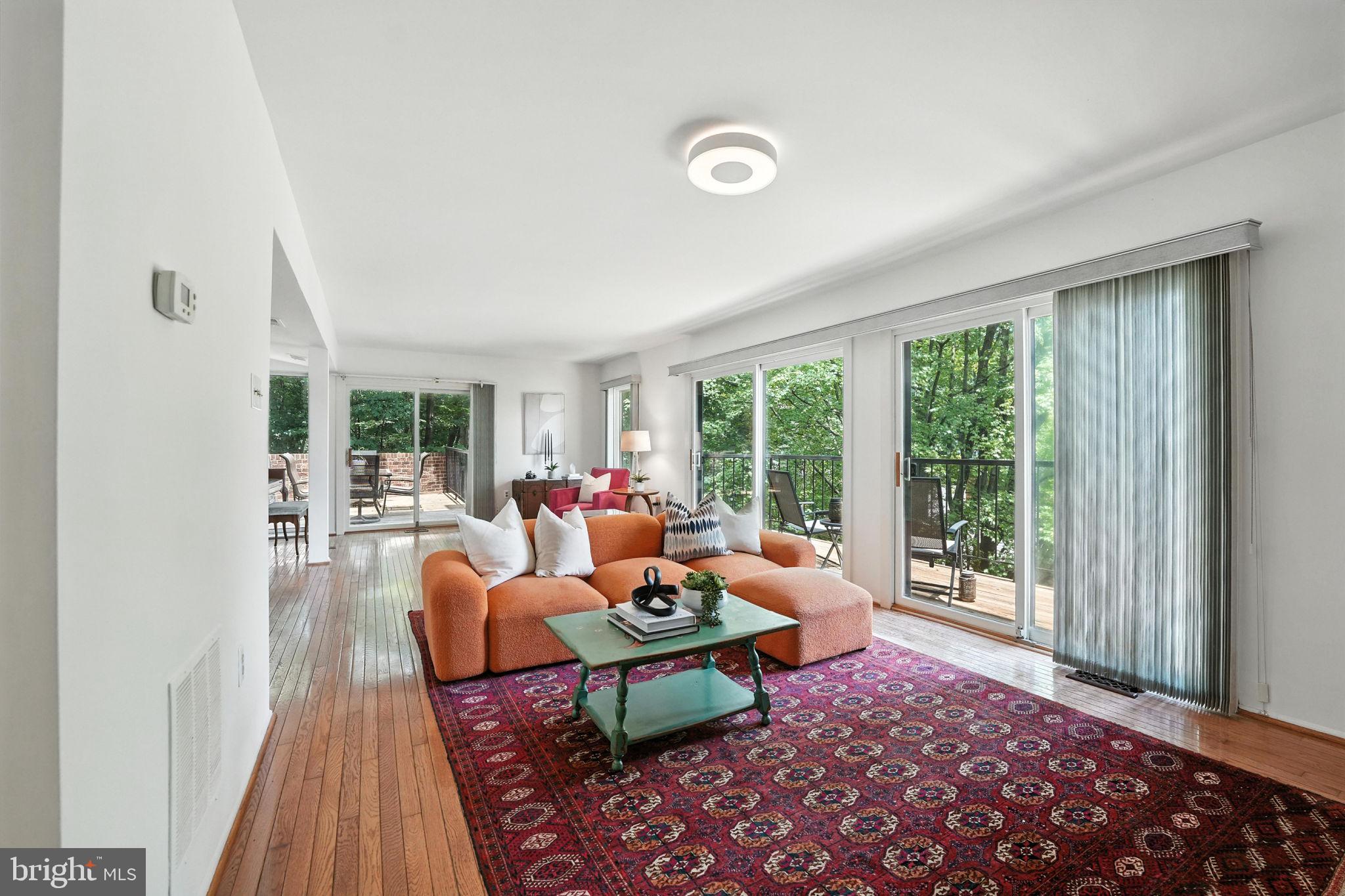 2151 Cabots Point Lane Reston, VA 20191 - Photo 8 of 71 a living room with furniture and a rug