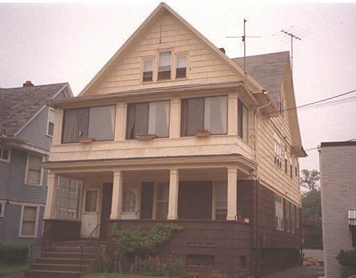 39 Roosevelt Street Bridgeport, CT 06608 - Photo 1 of 1 a white building with a large windows