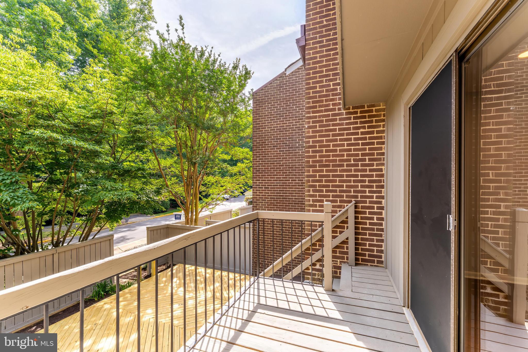 12023 Insha Court Reston, VA 20191 - Photo 50 of 52 a view of balcony with wooden floor