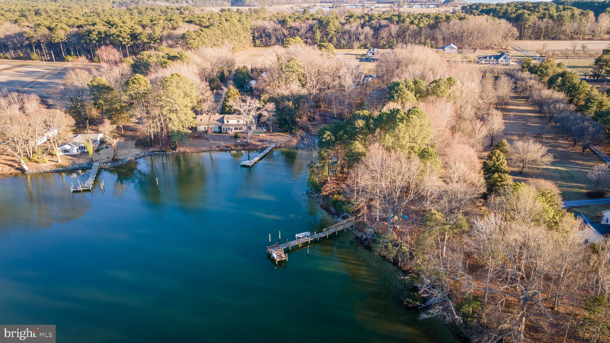 48830 Curleys Road Ridge, MD 20680 - Photo 11 of 65 a view of a lake in middle of the town