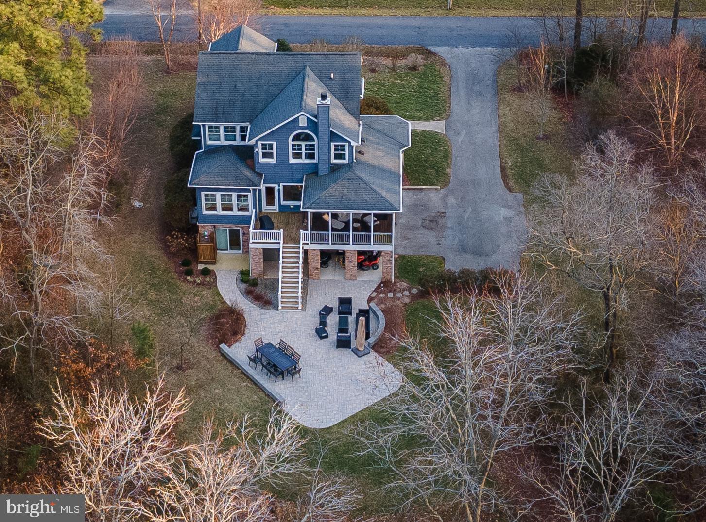 48830 Curleys Road Ridge, MD 20680 - Photo 2 of 65 an aerial view of a house with a yard