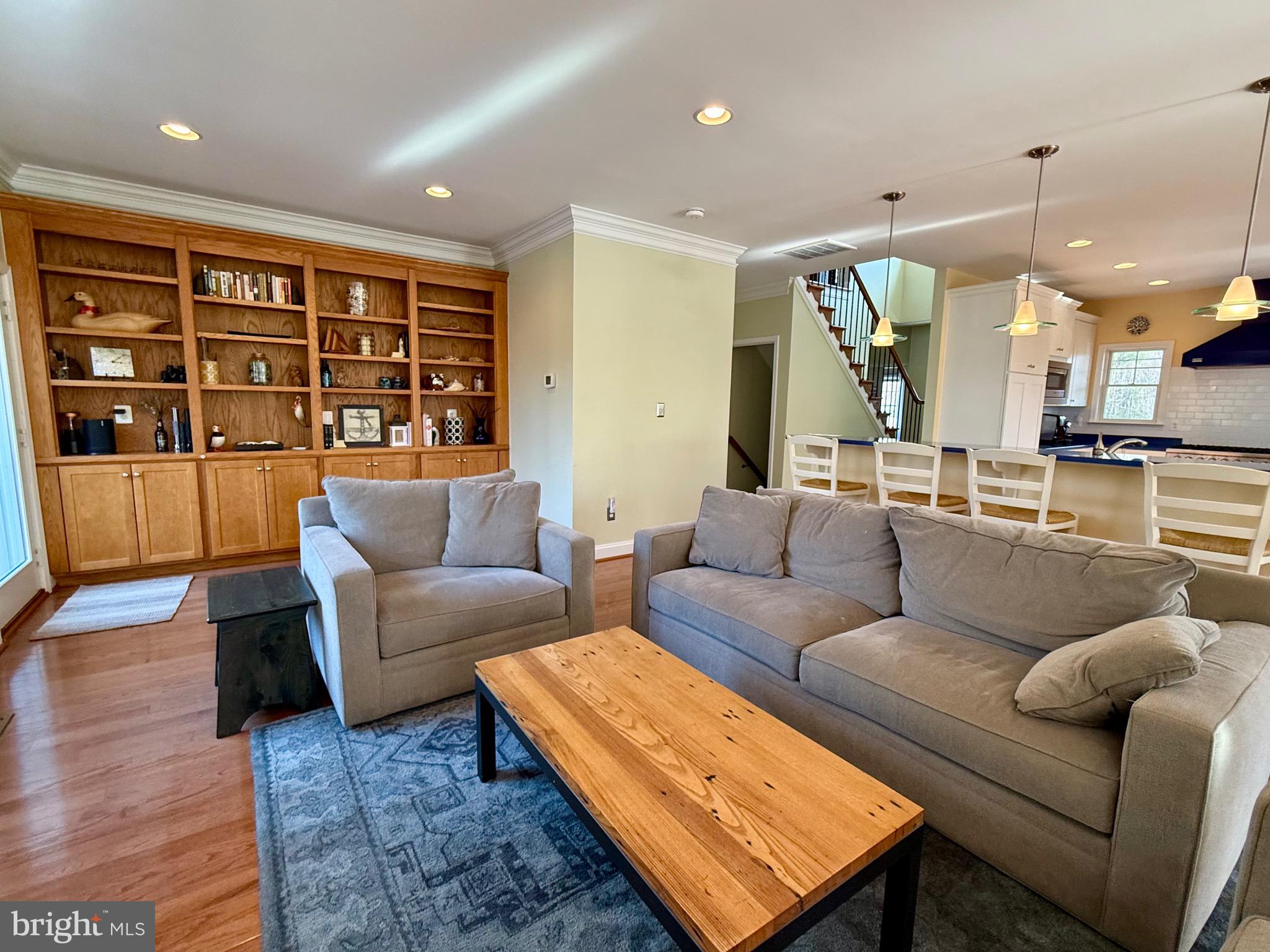 48830 Curleys Road Ridge, MD 20680 - Photo 23 of 65 a living room with furniture and a large window