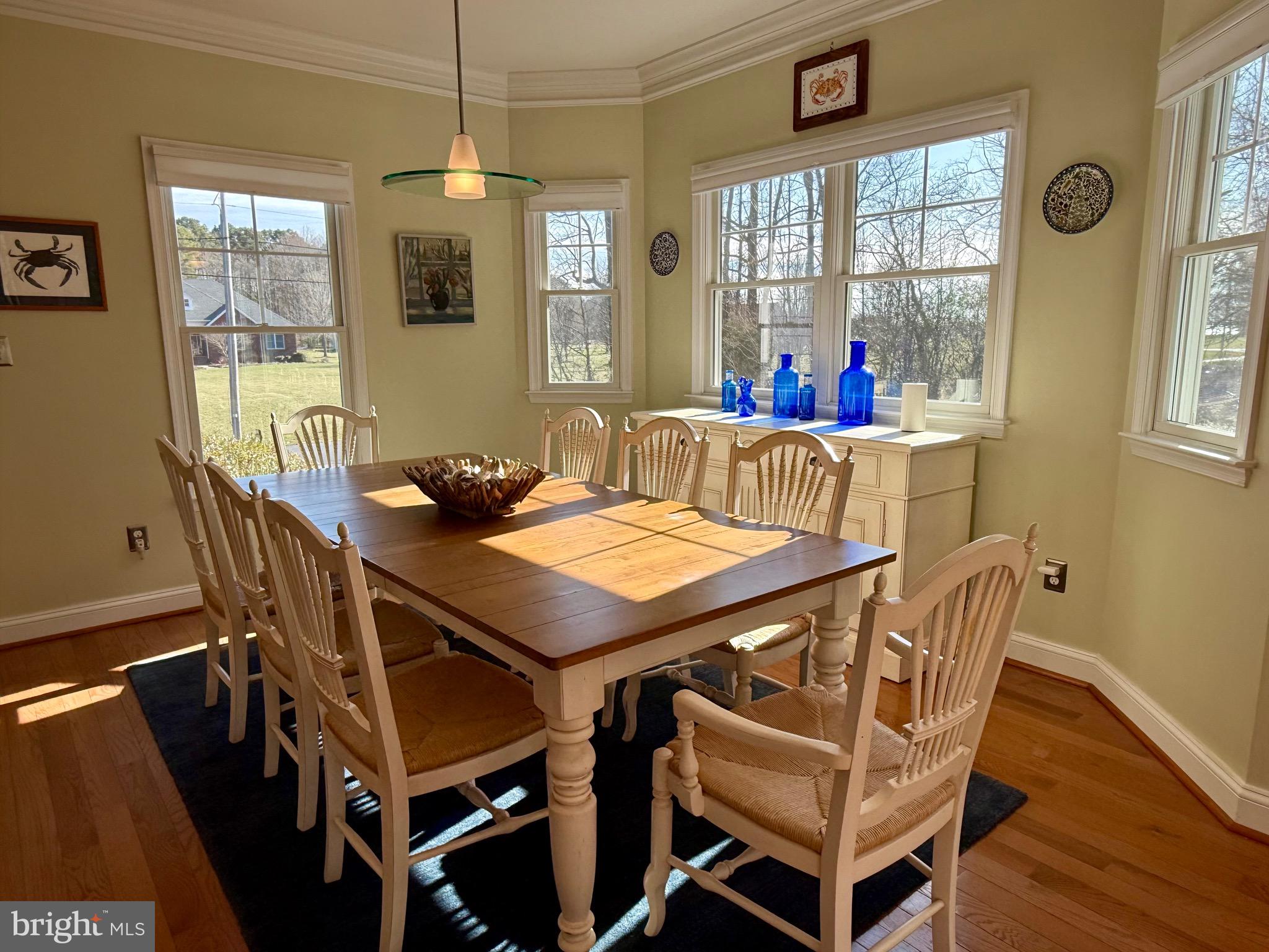 48830 Curleys Road Ridge, MD 20680 - Photo 24 of 65 a view of a dining room with furniture window and outside view