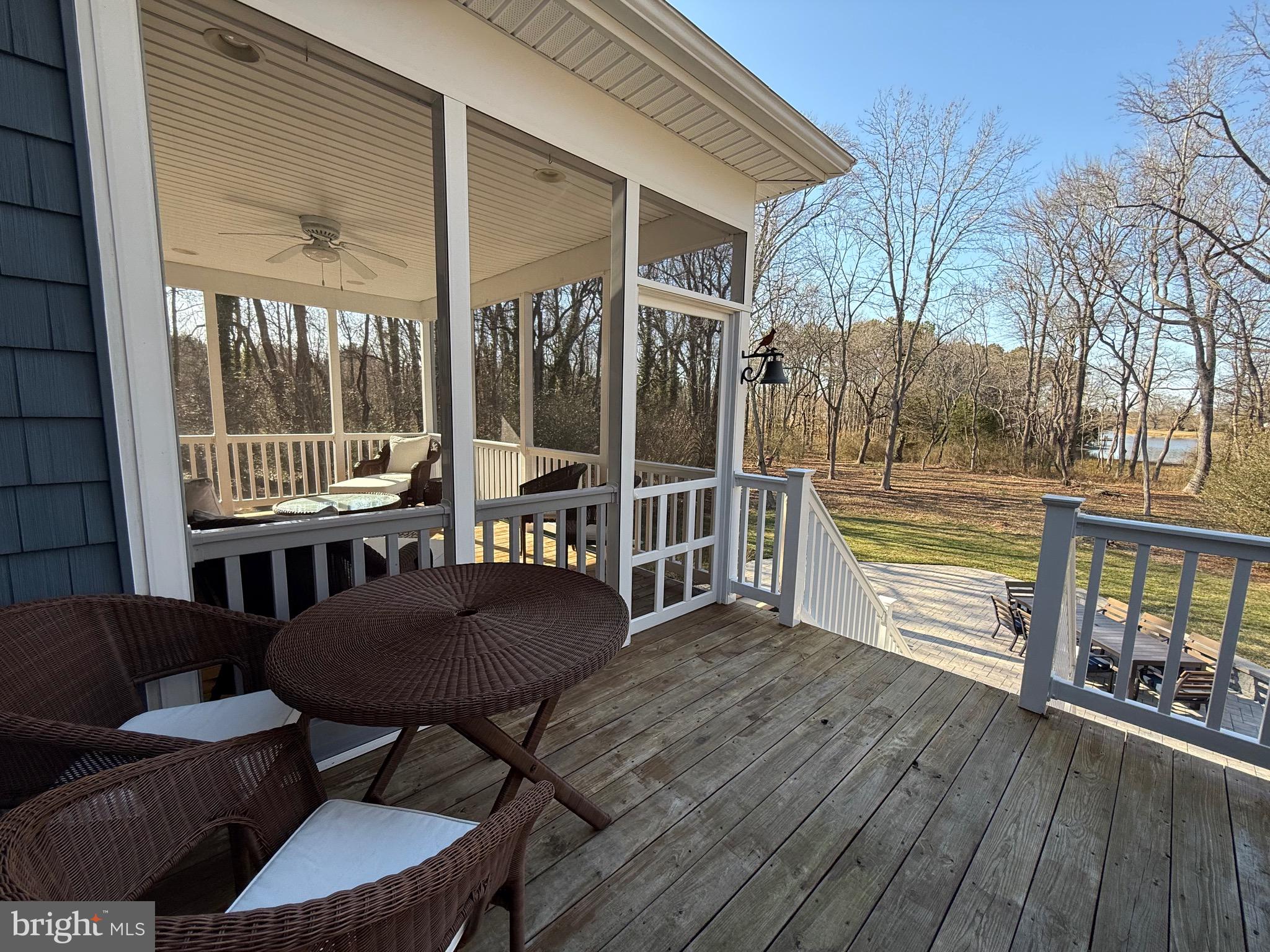 48830 Curleys Road Ridge, MD 20680 - Photo 64 of 65 a view of a two chairs and table in the balcony