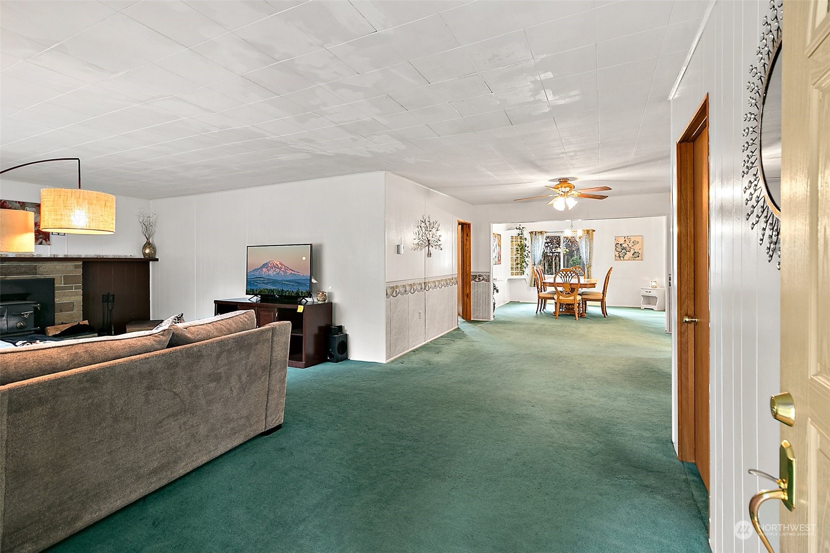 7639 191st Avenue Southwest Rochester, WA 98579 - Photo 3 of 40 a living room with furniture and a fireplace