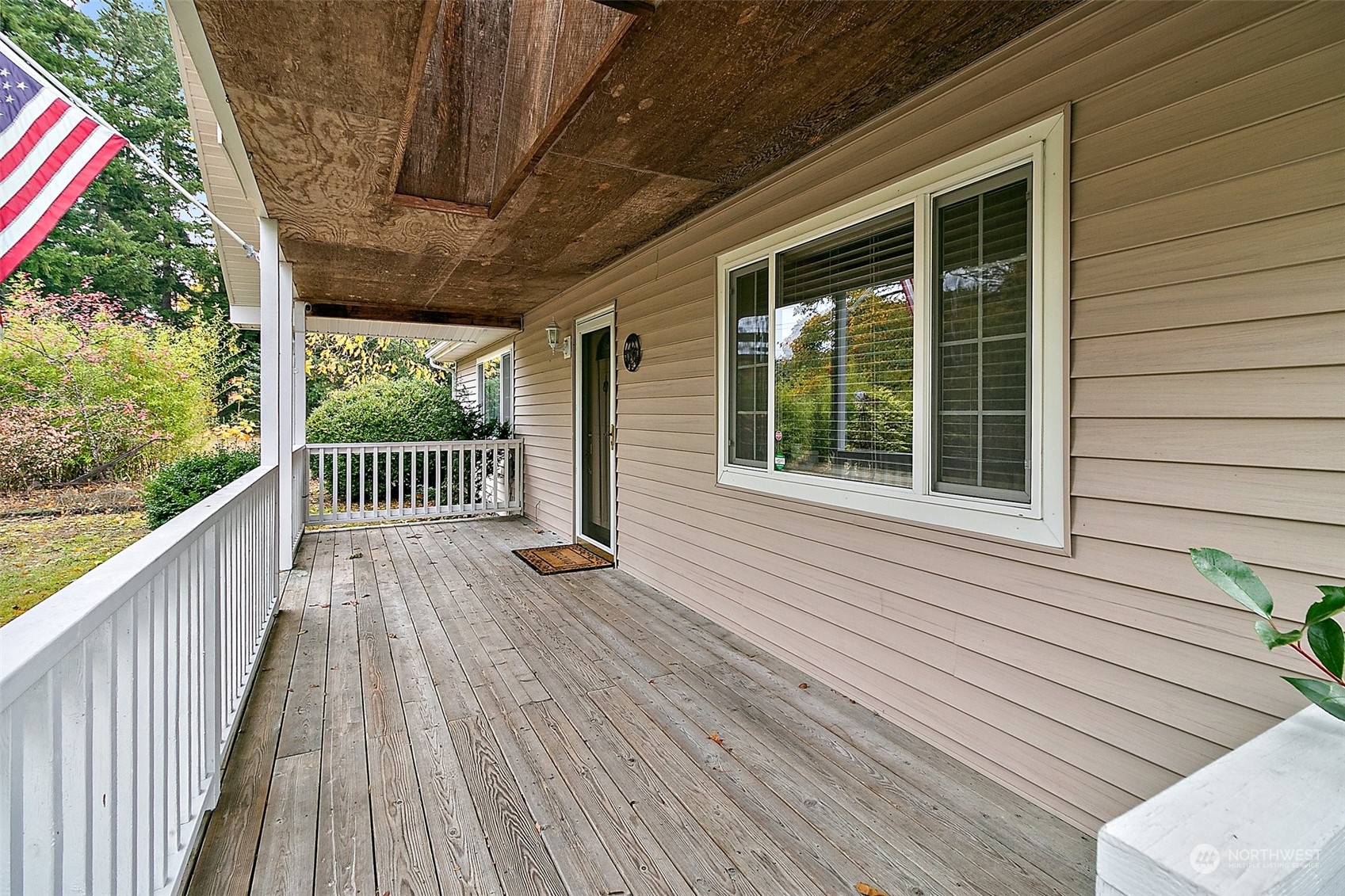 7639 191st Avenue Southwest Rochester, WA 98579 - Photo 32 of 40 a view of balcony with wooden floor