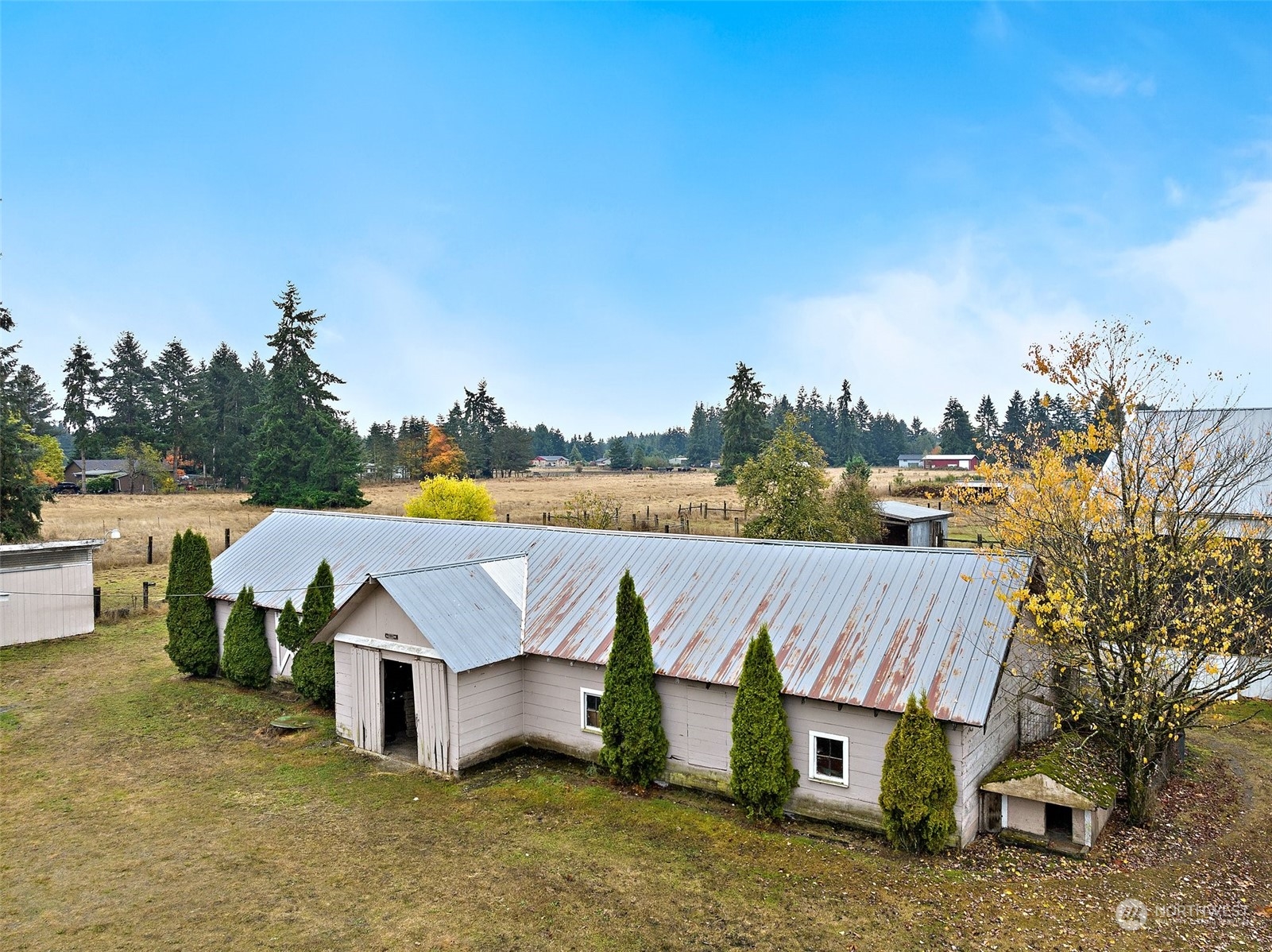 7639 191st Avenue Southwest Rochester, WA 98579 - Photo 36 of 40 a view of an house with outdoor space and seating