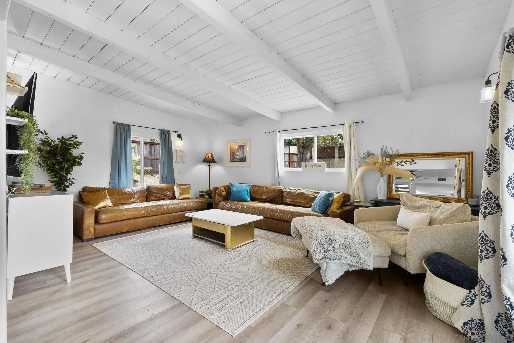 4173 Terry Street Oceanside, CA 92056 - Photo 2 of 28 a living room with furniture and a large window