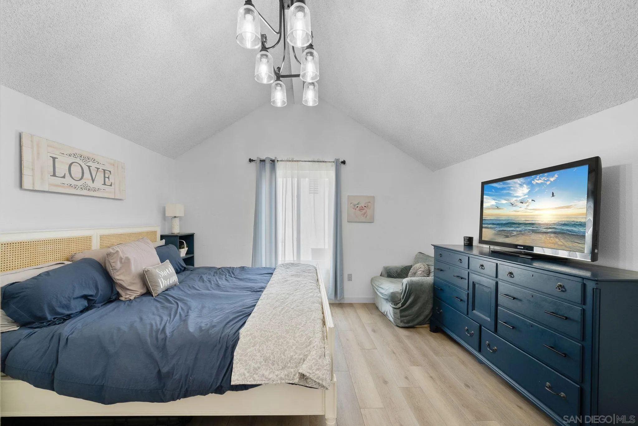 4173 Terry Street Oceanside, CA 92056 - Photo 22 of 28 a living room with furniture and a flat screen tv