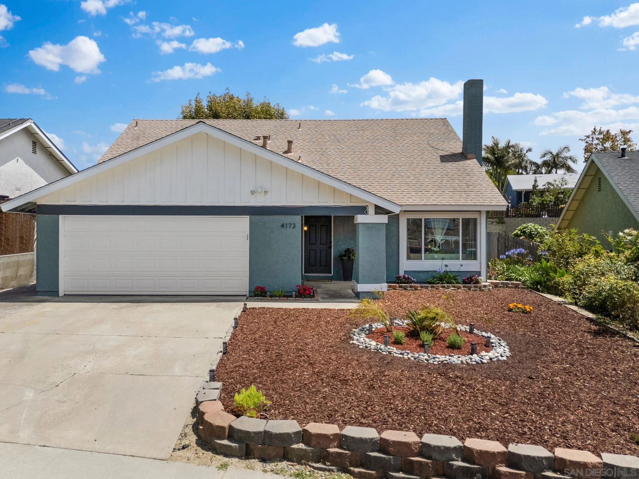 4173 Terry Street Oceanside, CA 92056 - Photo 24 of 28 a front view of a house with a yard