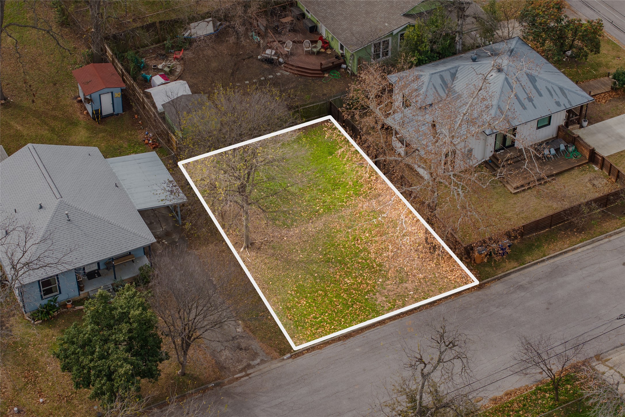an aerial view of house with pool