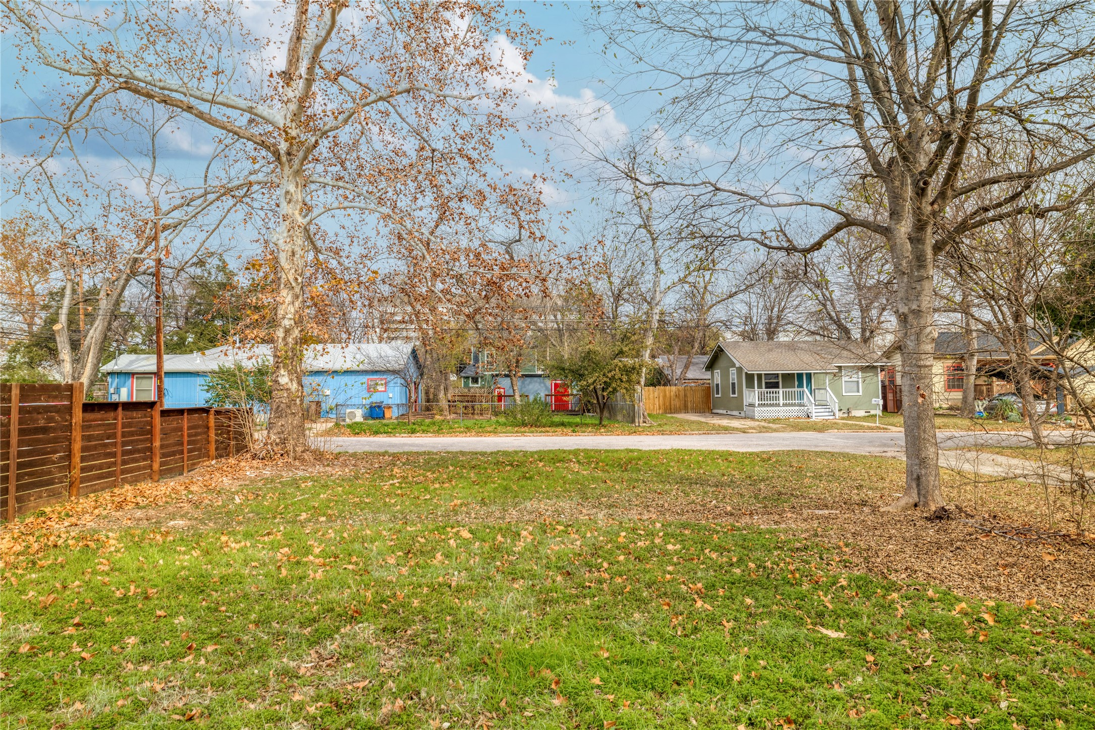 927 West 56th Street Austin, TX 78751 - Photo 6 of 13 a view of yard with swimming pool and trees