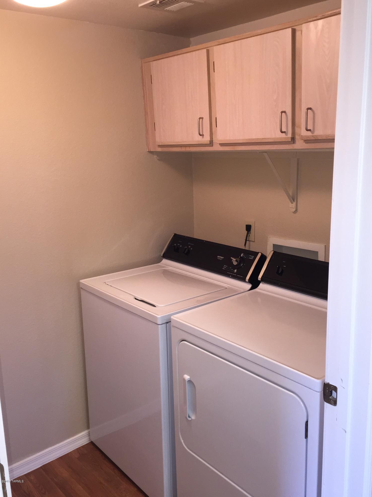 5751 North Kolb Road, Unit 28201 Tucson, AZ 85750 - Photo 9 of 14 a utility room with dryer and washer