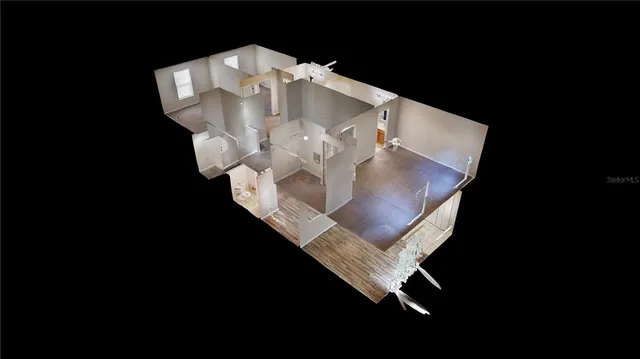 a view of a living room with furniture