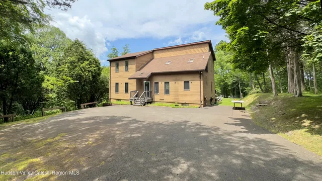 a house with trees in front of it