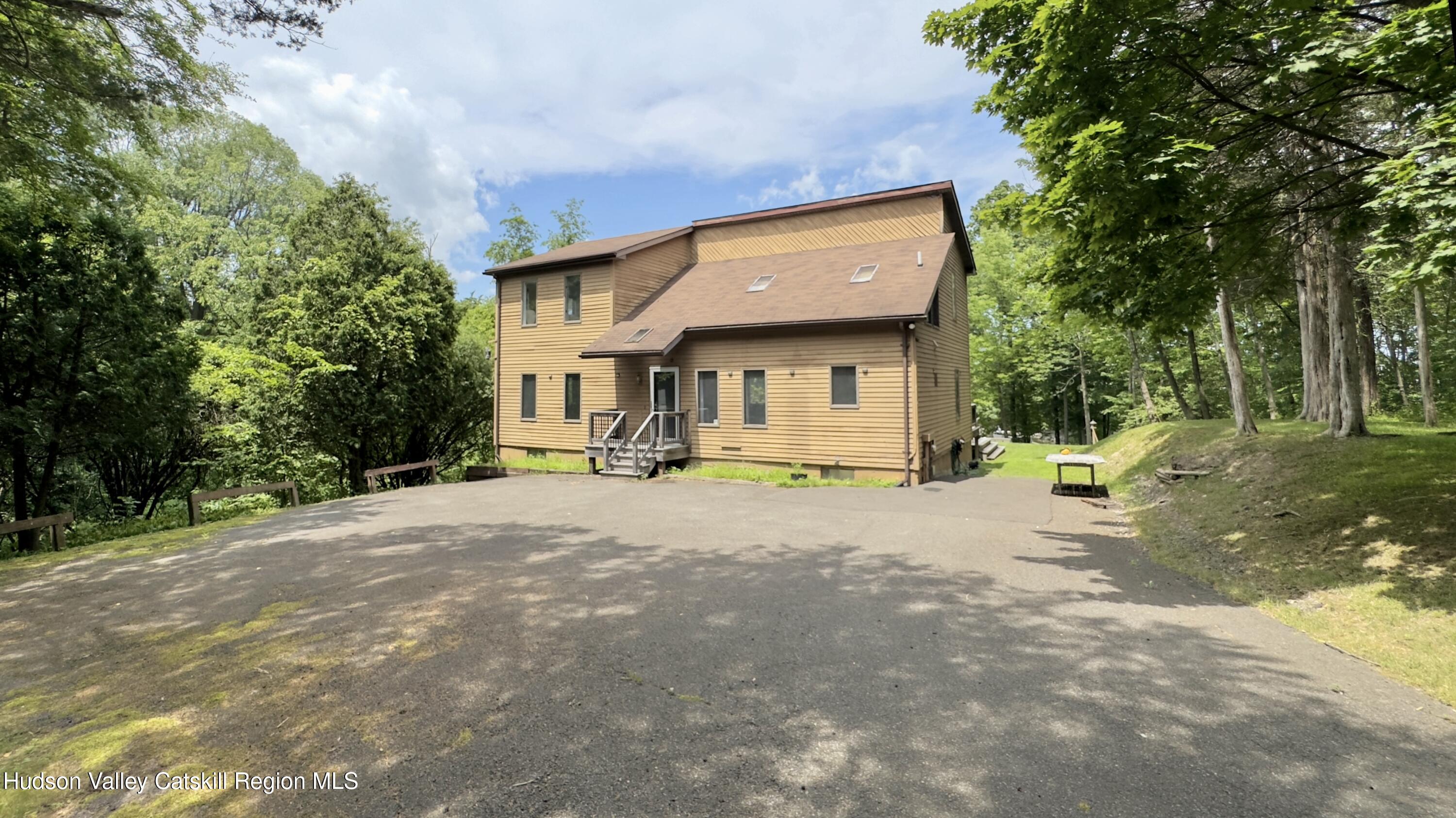 a house with trees in front of it