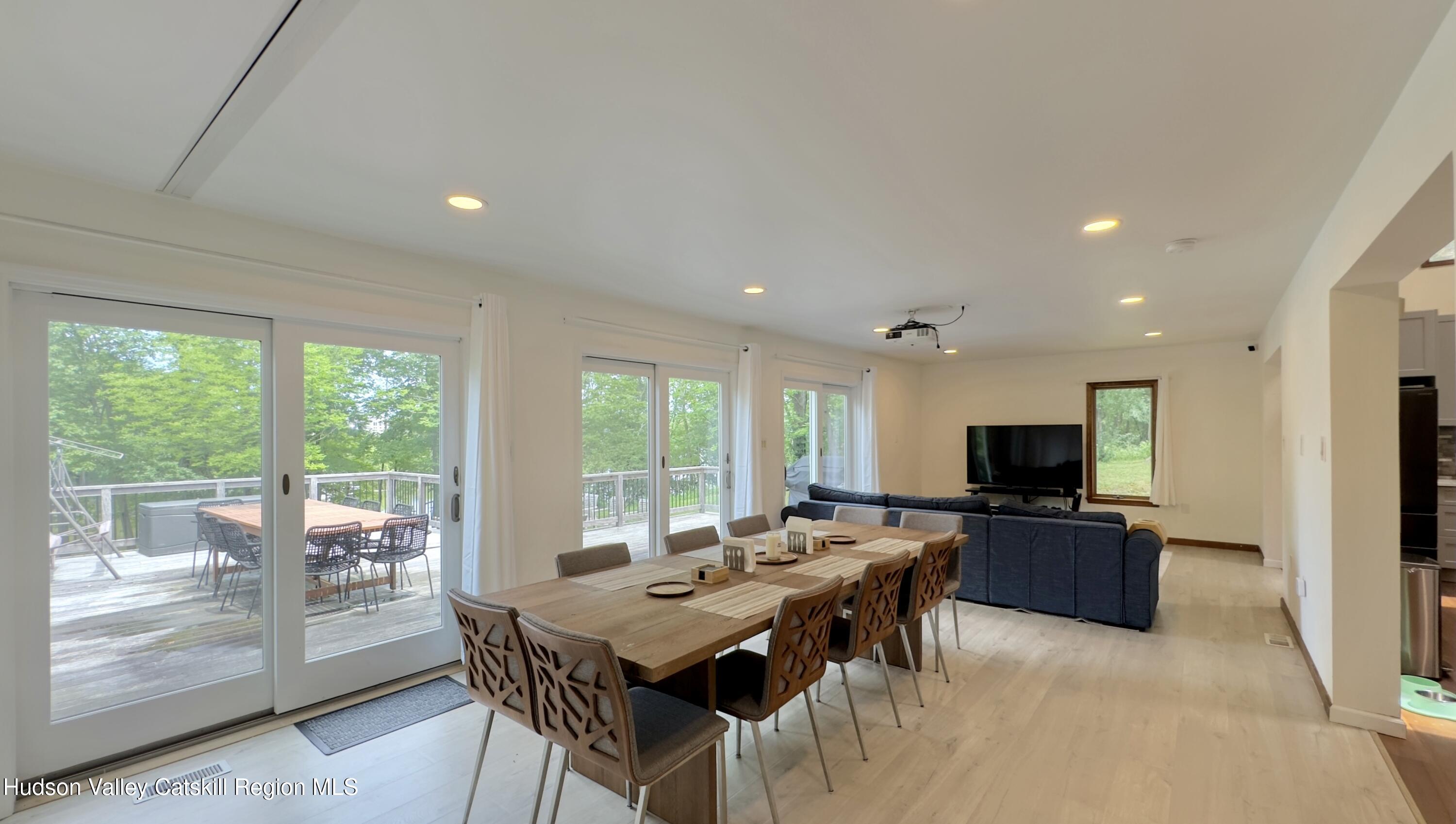 3223 Sleepy Hollow Road Athens, NY 12015 - Photo 13 of 73 a view of a dining room with furniture window and outside view