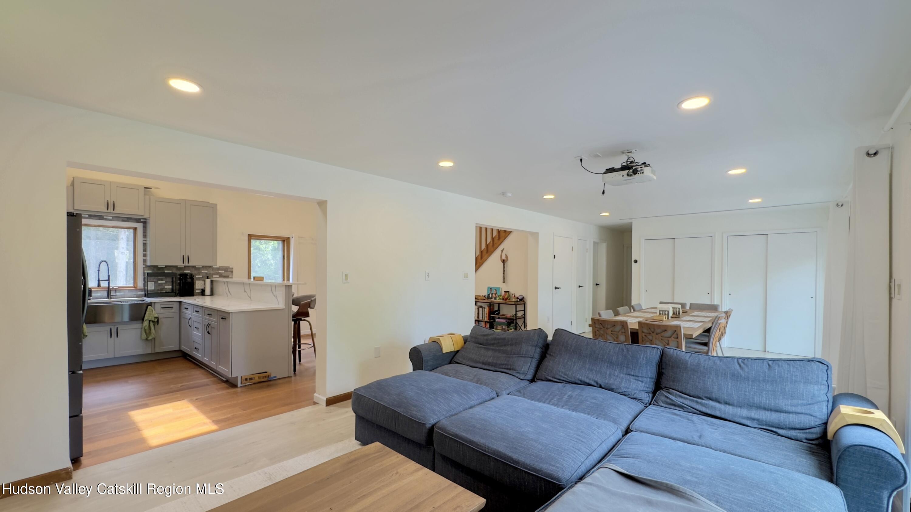 3223 Sleepy Hollow Road Athens, NY 12015 - Photo 15 of 73 a living room with furniture and view of kitchen