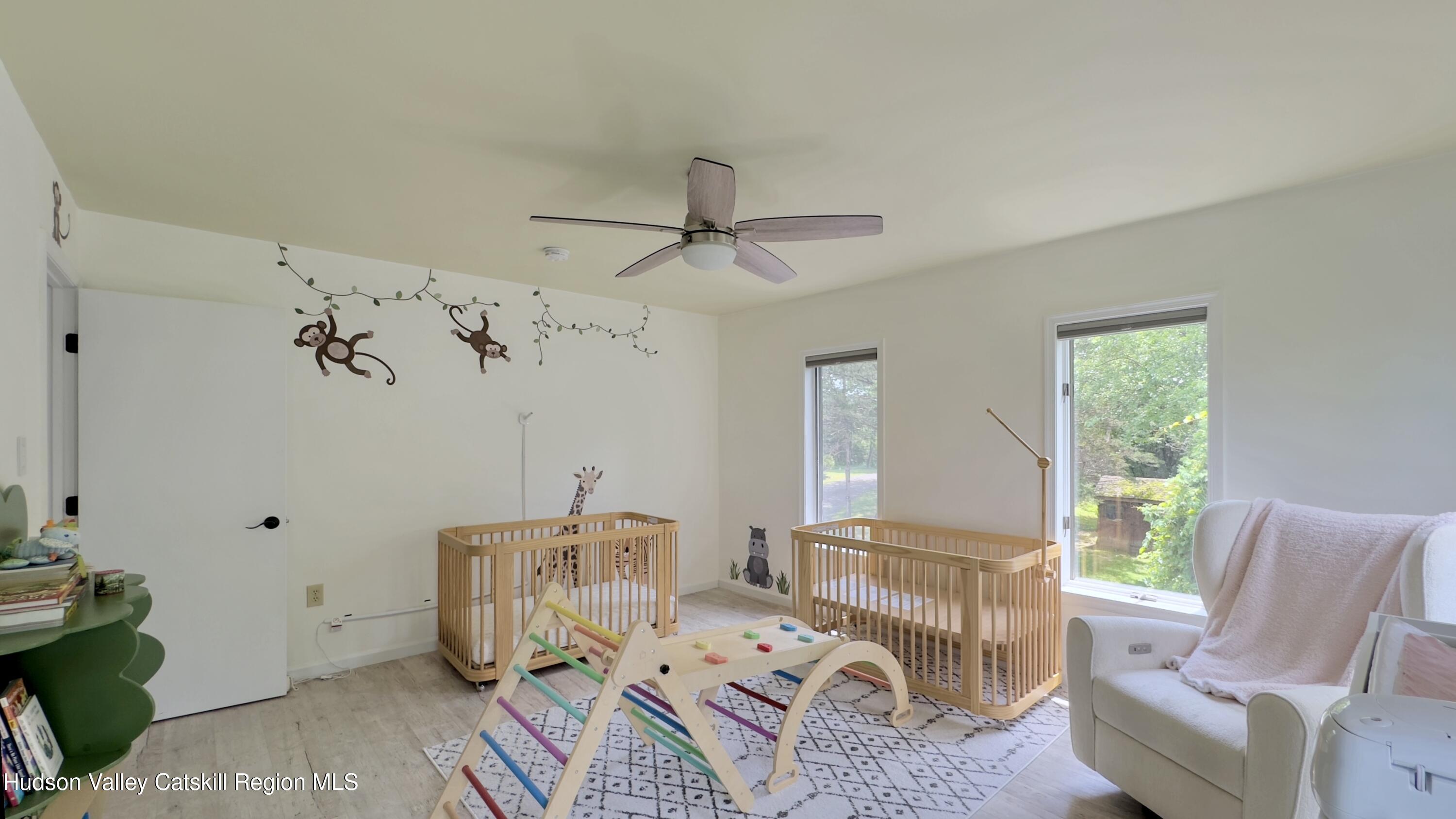 3223 Sleepy Hollow Road Athens, NY 12015 - Photo 31 of 73 a bedroom with furniture and a window
