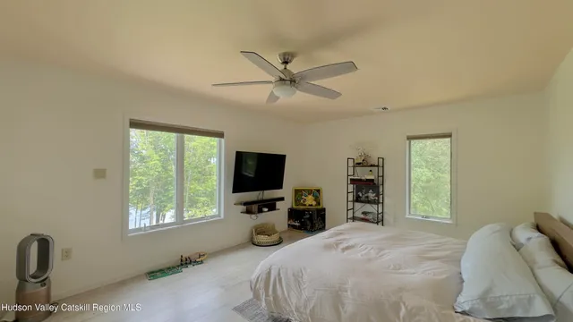 a view of a livingroom with furniture